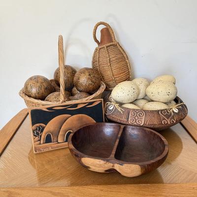 LOT 41F: Divided Wooden Bowl, Primitive Woven Gourd Vessel, L. Gwaia Wood Artwork, Pottery Bowl filled w/ Faux Eggs & Basket filled...