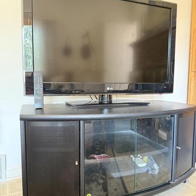LOT 44F: LG 42" Television Model 42LD220-UA w/ Media Stand