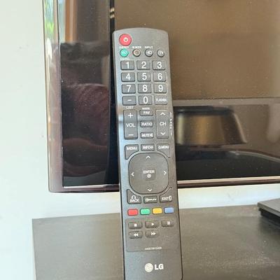 LOT 44F: LG 42" Television Model 42LD220-UA w/ Media Stand