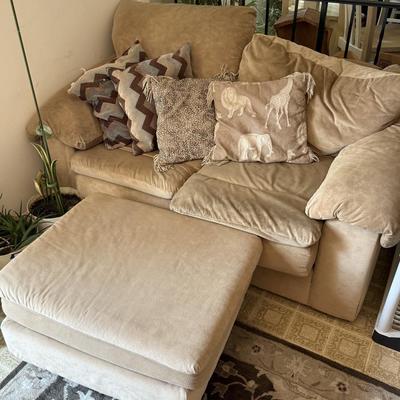 LOT 48F: Pair of Loveseats w/ Decorative Pillows & Rolling Ottoman