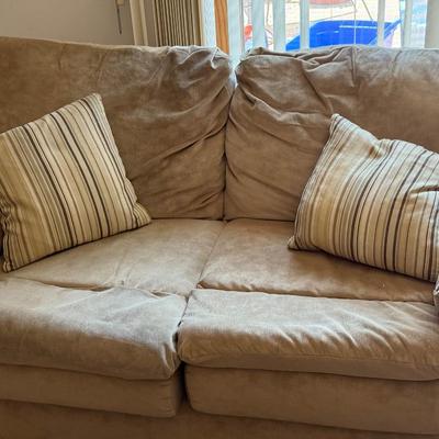 LOT 48F: Pair of Loveseats w/ Decorative Pillows & Rolling Ottoman