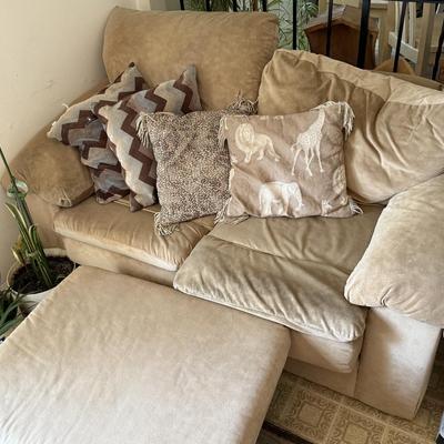 LOT 48F: Pair of Loveseats w/ Decorative Pillows & Rolling Ottoman