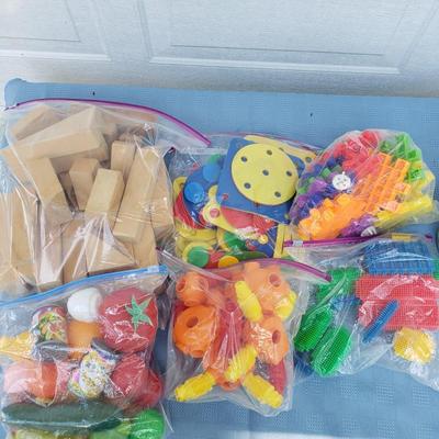 LOT 77G: Toy Collection; Vintage Fisher-Price Tea Set, Building Blocks, Spider Man Operation, and More