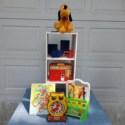 LOT 122G: Toy Collection; Vintage Euro Disney, Fisher-Price, Sesame Street, and More