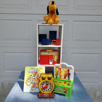LOT 122G: Toy Collection; Vintage Euro Disney, Fisher-Price, Sesame Street, and More