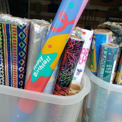 LOT 124G: Holiday Decor and Large Assortment of Wrapping Paper for Various Holidays