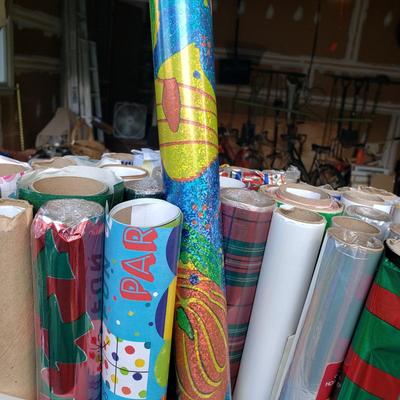 LOT 124G: Holiday Decor and Large Assortment of Wrapping Paper for Various Holidays
