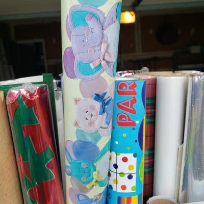 LOT 124G: Holiday Decor and Large Assortment of Wrapping Paper for Various Holidays