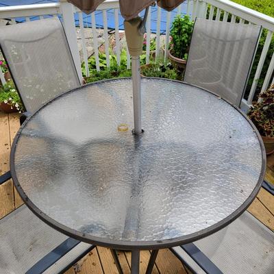 LOT 155P: Glass Round Patio Table with Four Chairs and Unfolding Umbrella