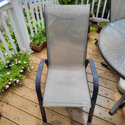 LOT 155P: Glass Round Patio Table with Four Chairs and Unfolding Umbrella