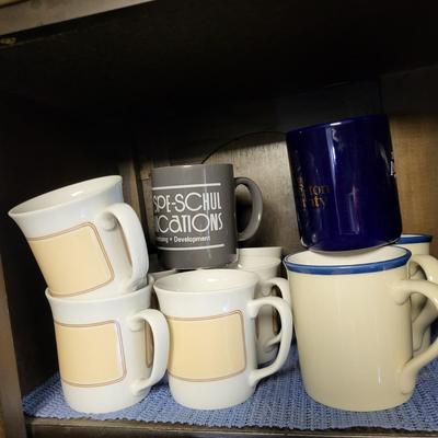 LOT 158K: Cabinet Full of Various Coffee Mugs, Plates and More