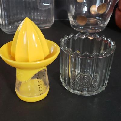 LOT 223K: Kitchen Accessories; Turned Wood Bowls, Vintage Glass Refrigerator Bottle, Vintage Toast Racks, and More