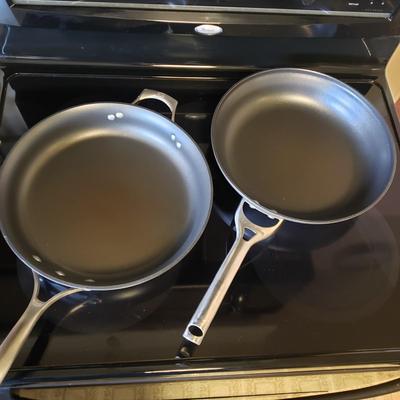 LOT 225K: Large Assortment of Pots and Pans; Cuisinart, Calphalon, and More