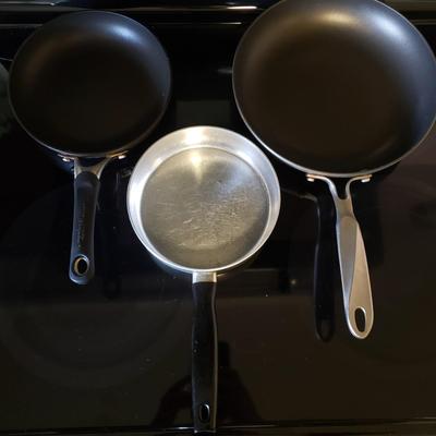 LOT 225K: Large Assortment of Pots and Pans; Cuisinart, Calphalon, and More