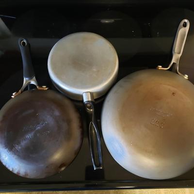 LOT 225K: Large Assortment of Pots and Pans; Cuisinart, Calphalon, and More