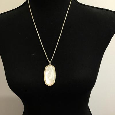 Sale Photo Thumbnail #89: Gold tone, slider, necklace, and pendant with mother pearl. Please see attached photos.