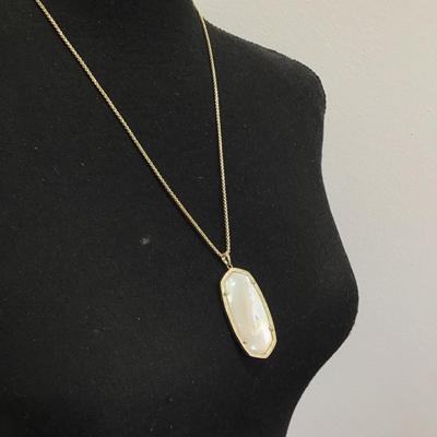Sale Photo Thumbnail #90: Gold tone, slider, necklace, and pendant with mother pearl. Please see attached photos.