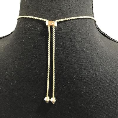 Sale Photo Thumbnail #91: Gold tone, slider, necklace, and pendant with mother pearl. Please see attached photos.