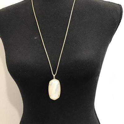 Sale Photo Thumbnail #93: Gold tone, slider, necklace, and pendant with mother pearl. Please see attached photos.