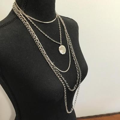 Sale Photo Thumbnail #106: SilverTone multi strand, fashion, statement, necklace with locket . Please see attached photos.