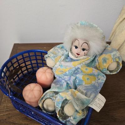 Doll in heart basket