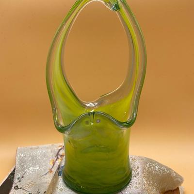 Sale Photo Thumbnail #293: Beautiful pale green blown glass vase in a basket style, no makers mark.  
9.5 x 4 inches