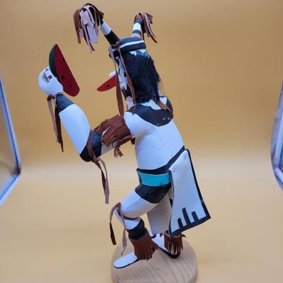 Sale Photo Thumbnail #297: Artist = Largo     Beautiful Clown Kachina with leather accents.
14.5 inches tall.  Retails at $350 to  $900
Noted Largo artists include Francis Largo, Gary Largo, N. Largo and M.E. Largo
The Clown Kachina is a significant figure in Native American cultur