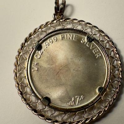 Art Nouveau .999 silver 1/4 round carved profile of woman