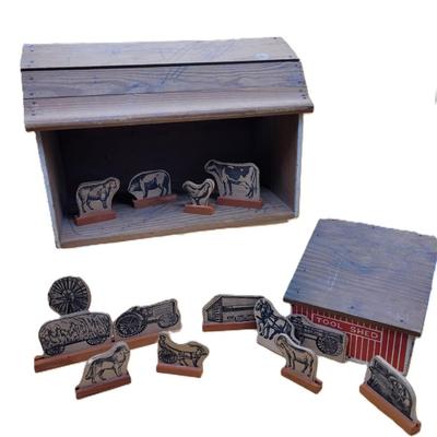 Sale Photo Thumbnail #302: Complete with wooden animals and matching tool shed.  Includes non=original plastic animals.
12 inches x 9 inches tall.  From the 1940's.  
Retails at $ 270.00