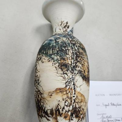 Sale Photo Thumbnail #312: Tree Motif.  Blue, brown, cream colors.
Dated 1981     Thrown Pottery
10 inches tall x 4 inches wide