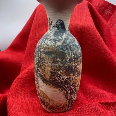 Sale Photo Thumbnail #314: Tree Motif.  Blue, brown, cream colors.
Dated 1981     Thrown Pottery
10 inches tall x 4 inches wide