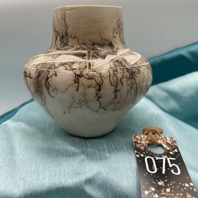 Sale Photo Thumbnail #319: Signed - Vail  
The Vail family is well known for their contemporary style of pottery known as 'horse hair'.  
Very good condition, 4.5 inches diameter 
Retail  $25 TO $60