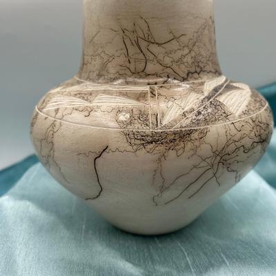 Sale Photo Thumbnail #318: Signed - Vail  
The Vail family is well known for their contemporary style of pottery known as 'horse hair'.  
Very good condition, 4.5 inches diameter 
Retail  $25 TO $60