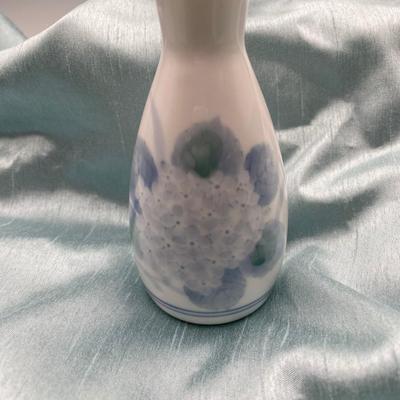 Sale Photo Thumbnail #325: Flask and 3 cups, signed.  White and blue.
Floral design, excellent condition 
Retail 40.00 to $70