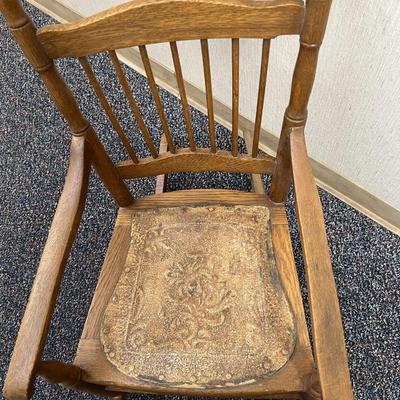 Sale Photo Thumbnail #331: This is a real treasure, there is so much charm and character here.  
Child or Junior Oak and brass rocking chair.  Leather seat.
One rocker has been expertly repaired with brass.  see photo 
34.5 inches tall, 17.75 inches wide.
The seat is 15.5 x 14 inch