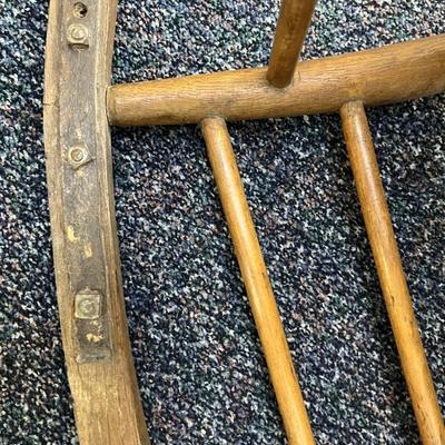 Sale Photo Thumbnail #330: This is a real treasure, there is so much charm and character here.  
Child or Junior Oak and brass rocking chair.  Leather seat.
One rocker has been expertly repaired with brass.  see photo 
34.5 inches tall, 17.75 inches wide.
The seat is 15.5 x 14 inch