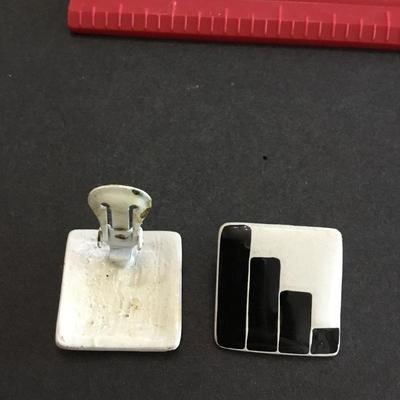 Retro black and white enamel square clip on earrings. Very cool.