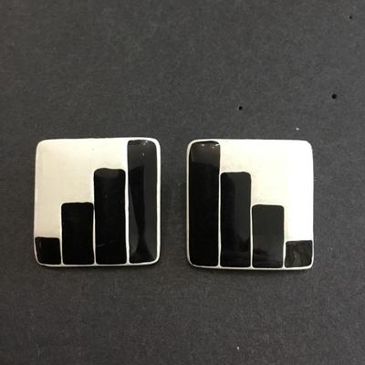Retro black and white enamel square clip on earrings. Very cool.