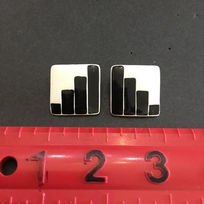 Retro black and white enamel square clip on earrings. Very cool.