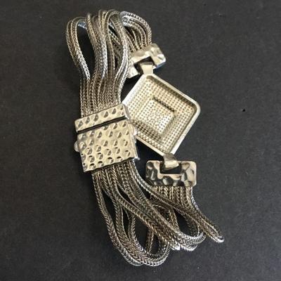 Very nice silver toned, magnetic bracelet