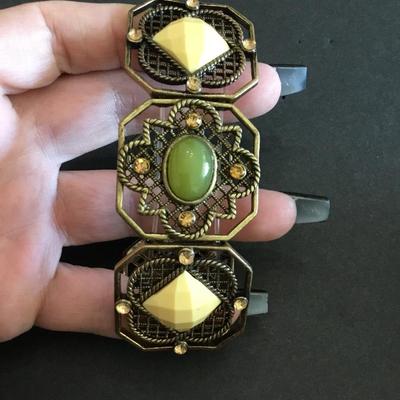 Very nice beautiful bronze toned stretch bracelet
