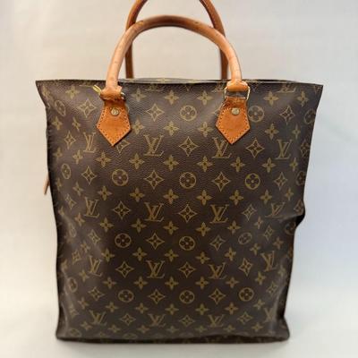 Louis Vuitton Monogram Tote (tear on side)