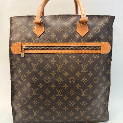Louis Vuitton Monogram Tote (tear on side)