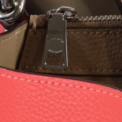 Lot 13: COACH - Stylish Coach Salmon Leather Purse with 3 Compartments