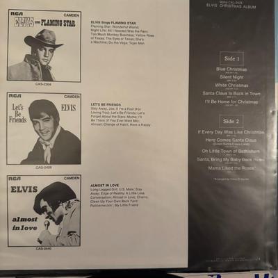 Sale Photo Thumbnail #137: The image is of Elvis' Christmas Album on vinyl, released by RCA Camden, catalog number CAL-2428. It shows Elvis Presley against a snowy backdrop, with the title "Elvis' Christmas Album". 
The album includes these Christmas songs:
"Blue Christmas"
"Silent