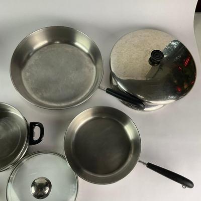 063 Large Lot of Assorted Revereware Cooking Pans & Pots With Matching Lids