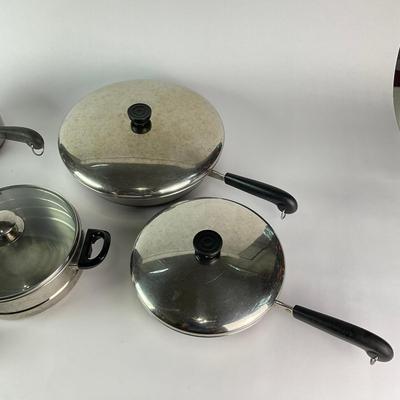 063 Large Lot of Assorted Revereware Cooking Pans & Pots With Matching Lids