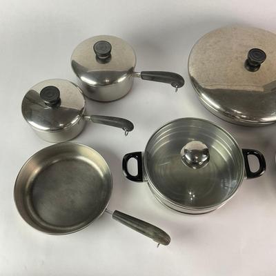 063 Large Lot of Assorted Revereware Cooking Pans & Pots With Matching Lids