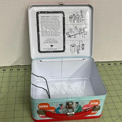 Sale Photo Thumbnail #20: Colorful cast illustration on front panel & Bright red plastic handle with secure metal latches.