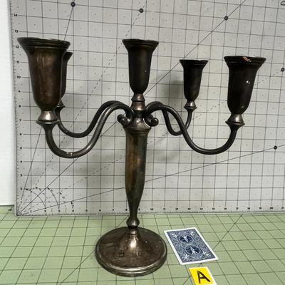 Sale Photo Thumbnail #22: Holds 5 standard taper candles and Likely silver-plated metal.